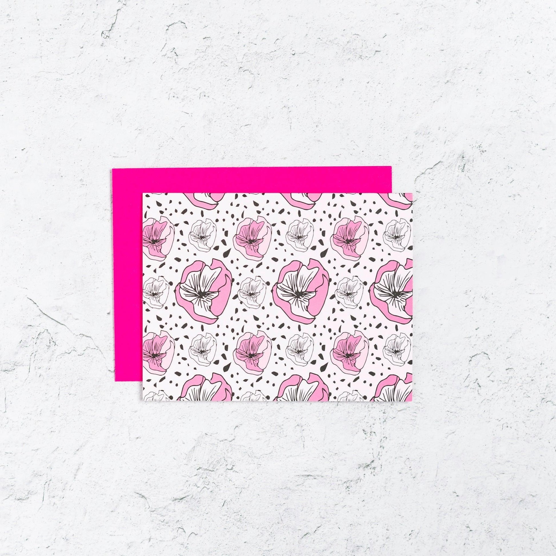 Bold pink and black floral note cards